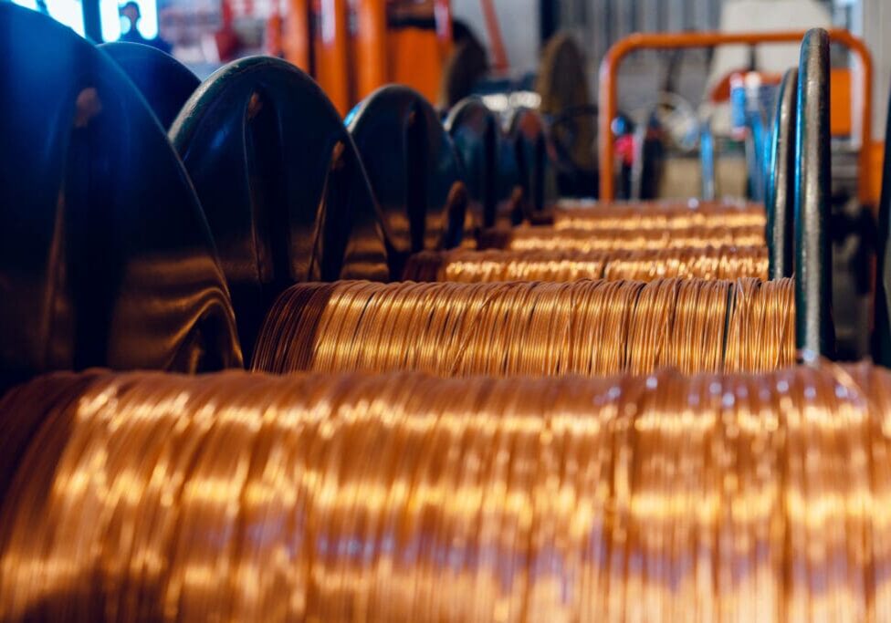 Production of copper wire, cable in reels at factory. Cable factory. Close up.